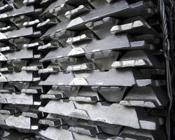 raw stacks of aluminum ingots for melting